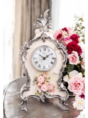 Orologio da tavolo in ceramica pregiata, con raffinati dettagli argentati, realizzato a mano.