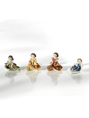 LE 4 STAGIONI - Porcellana di Capodimonte, statuette d'arte ispirate alle quattro stagioni.
