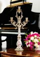 Candelabro 3 fiamme in pregiata ceramica, con eleganti decorazioni floreali ed oro, fatto a mano.