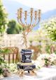 Candelabro 6 fiamme in pregiata ceramica, con angelo ed eleganti decorazioni oro, fatto a mano.