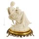 MADRE SULLA SEDIA A DONDOLO Statuetta statuina figura porcellana Capodimonte fatto a mano Made in Italy