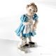 ALICE Statuetta fiabesca Capodimonte, grazia e magia italiana in porcellana.