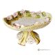 Alzata, centrotavola in ceramica pregiata, decorata con fiori e dettagli dorati, realizzata a mano.