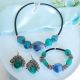 Set raffinato in vetro di Murano con perle autentiche: collana, bracciale e orecchini.