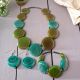 Set esclusivo di gioielli artigianali in vetro di Murano: collana, bracciale e orecchini.